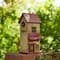 Glitzhome® 14.25" Yellow Washed Distressed Wood Cottage Birdhouse